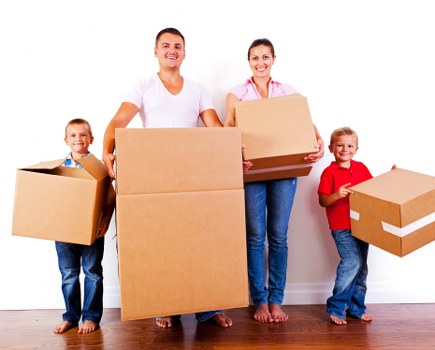 Professional movers assisting with a household move in New Malden