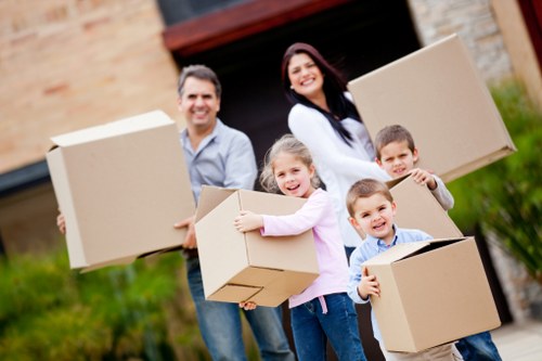 Professional movers assisting with a household move in Edgware