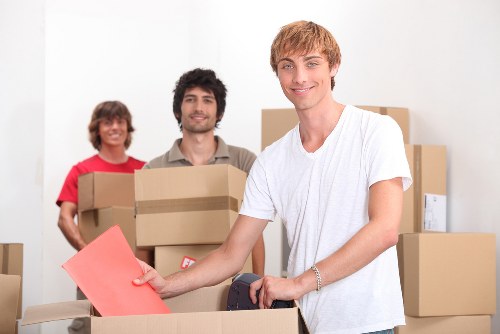 Professional packers securing items for a move